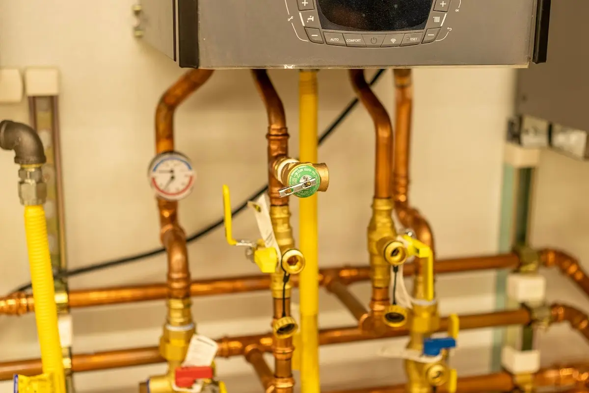 Licensed technician providing Water Heater Installation for a homeowner in Hayfield